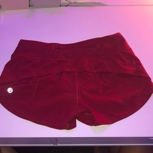Red Lululemon shorts